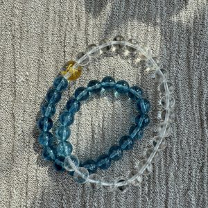 Dual Rings: Gold-Water · Celestial River Flow An energy bracelet exclusively for those aligned with the Water element.