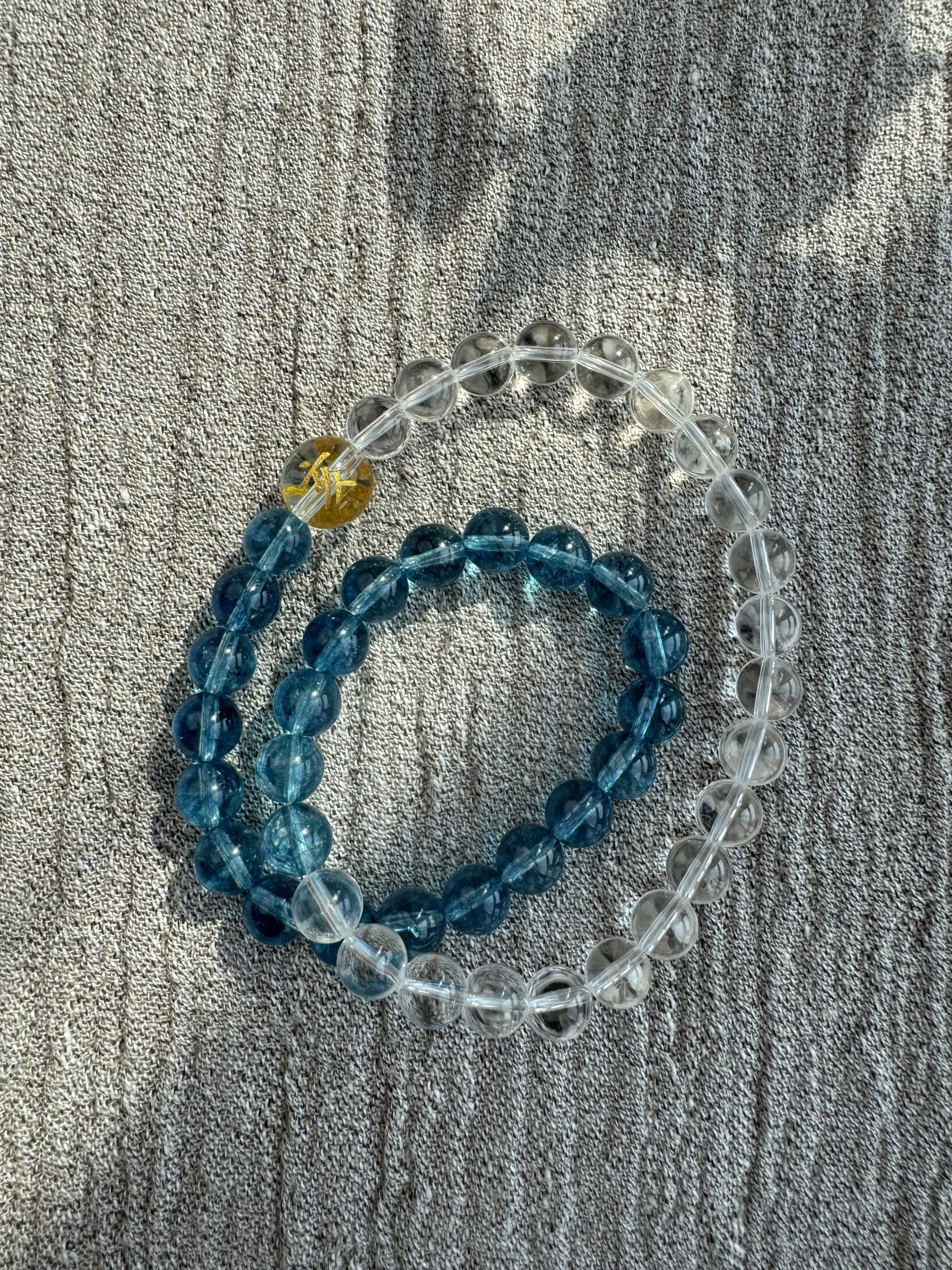 Dual Rings: Gold-Water · Celestial River Flow An energy bracelet exclusively for those aligned with the Water element.